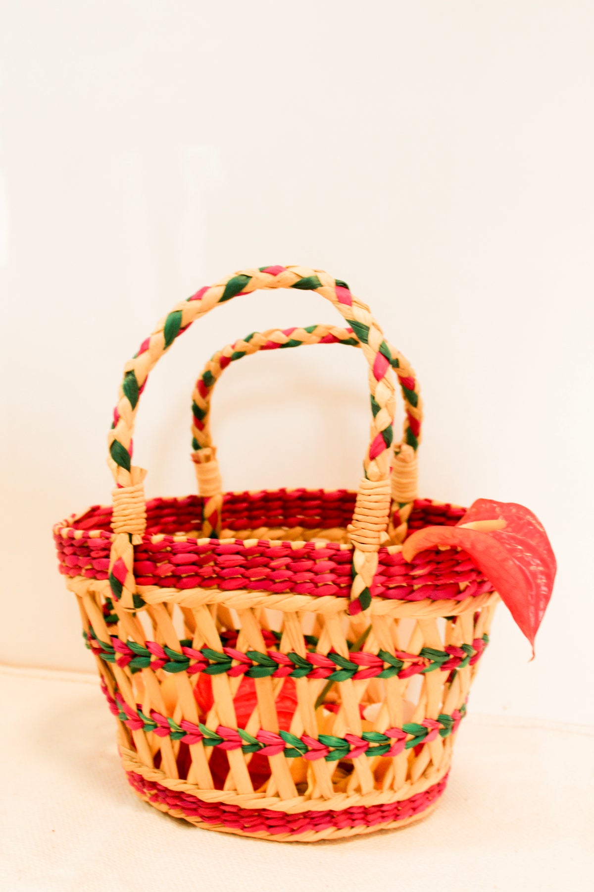 Multi color kauna basket with handles